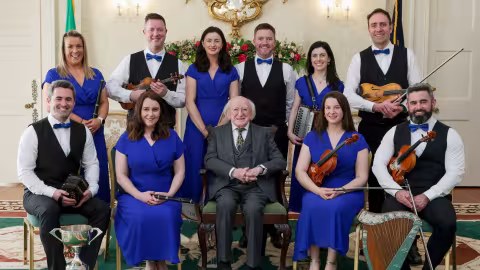 Image showing the Beartla O Flatharta C&eacute;ili Band members with President Higgins