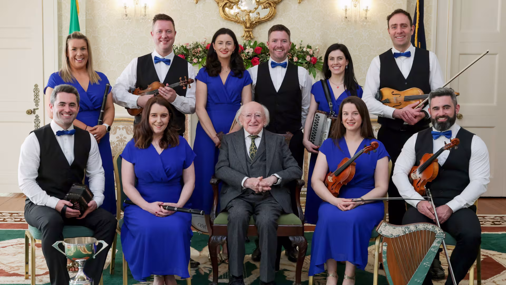 Image showing the Beartla O Flatharta Céili Band members with President Higgins